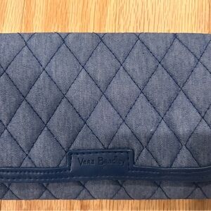Vera Bradley Denim Blue Wristlet with beautiful floral interior.